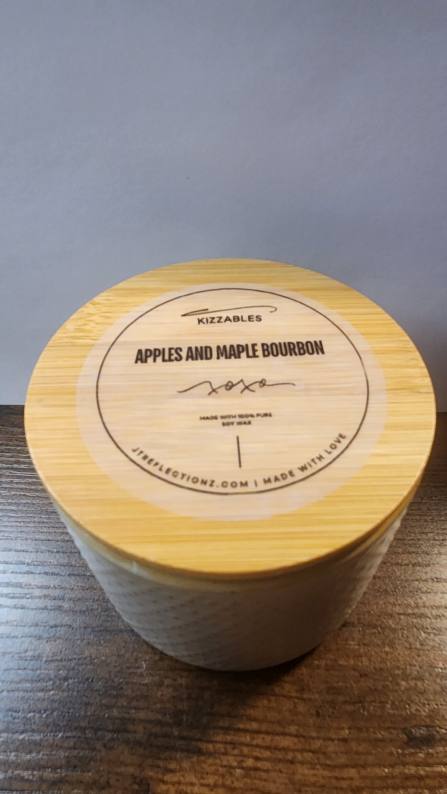 12 oz. gray soy candle with wood lid
