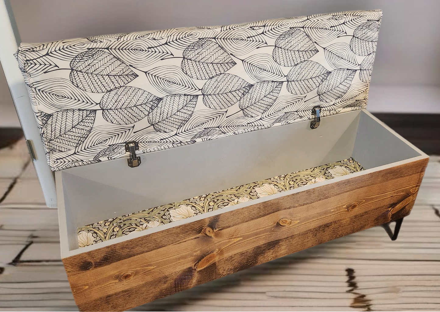 Storage bench with upholstered top