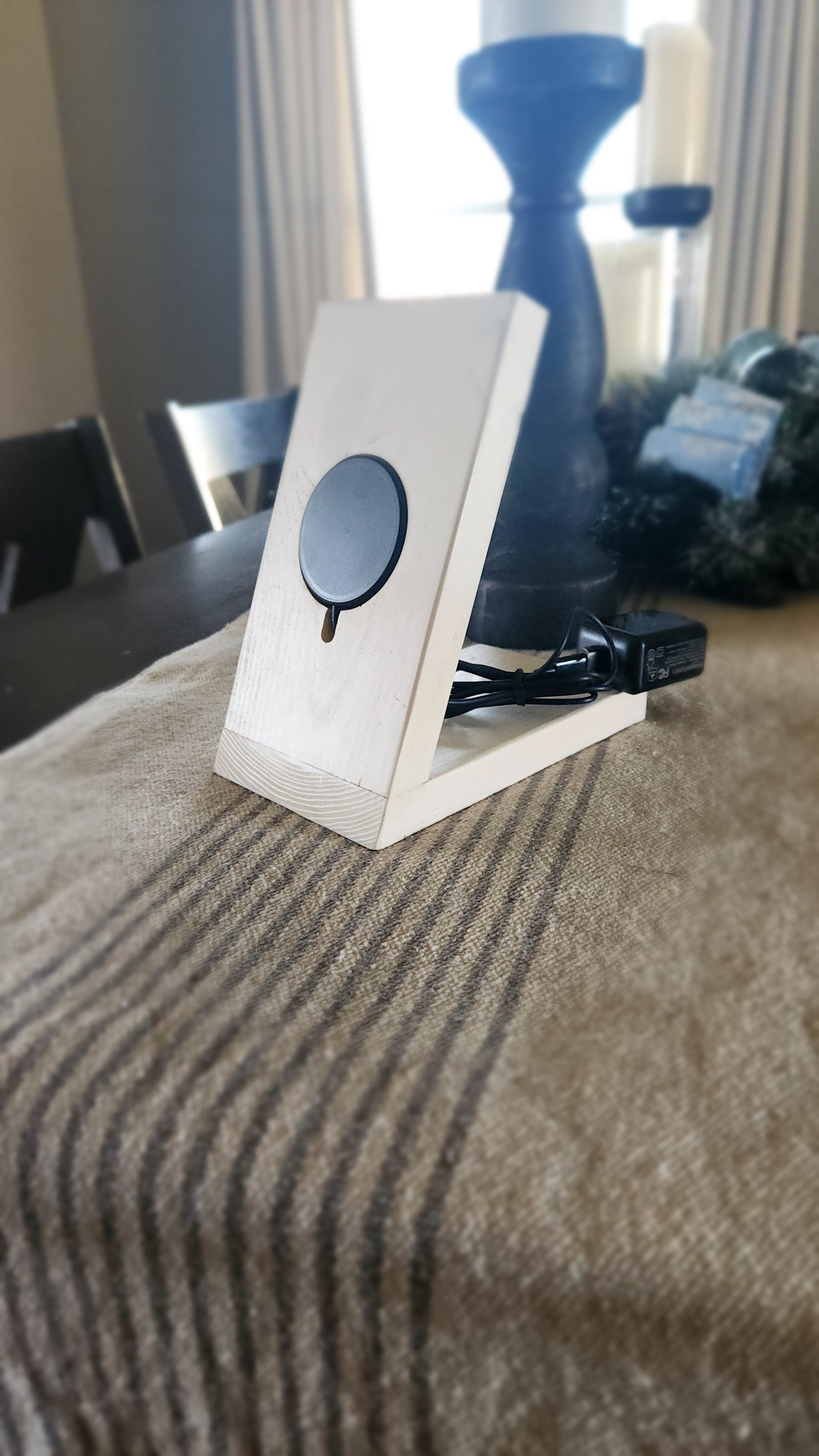 White iPhone holder with charger