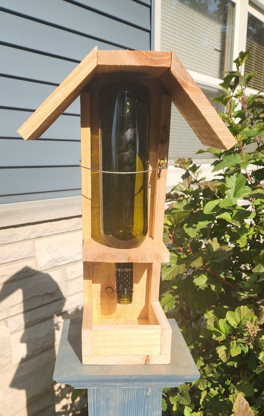 Wine bottle bird feeder