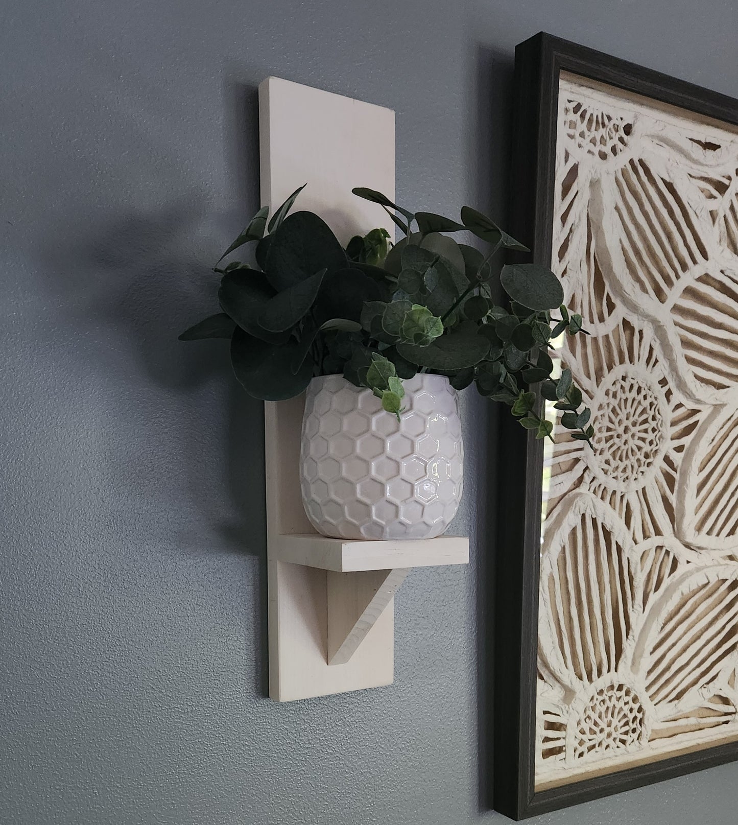 Slim white wall shelf