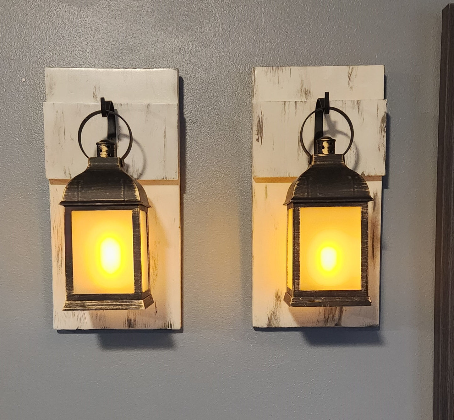 Wall mounted lighted lanterns