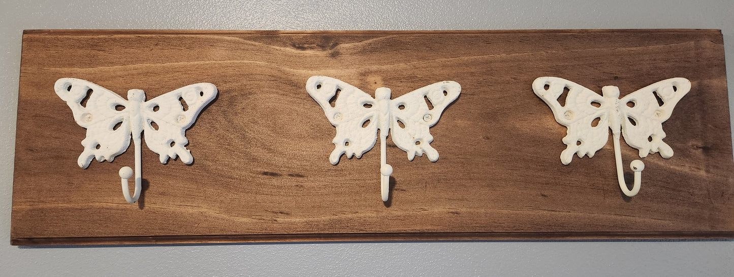 Wall mounted butterfly hook rack