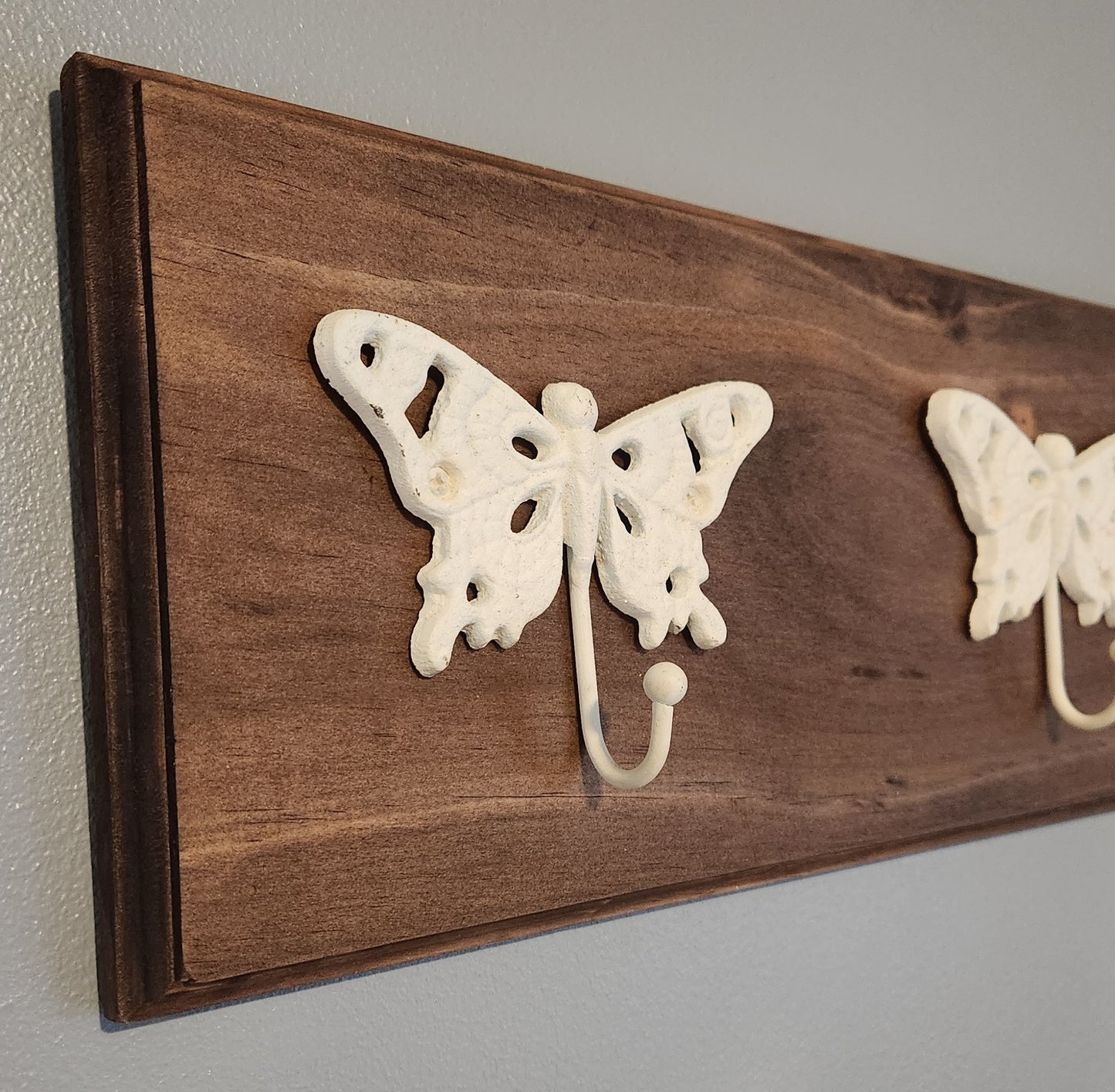 Wall mounted butterfly hook rack